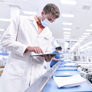 A pharmacist double-checks a medication at Express Scripts® Pharmacy.